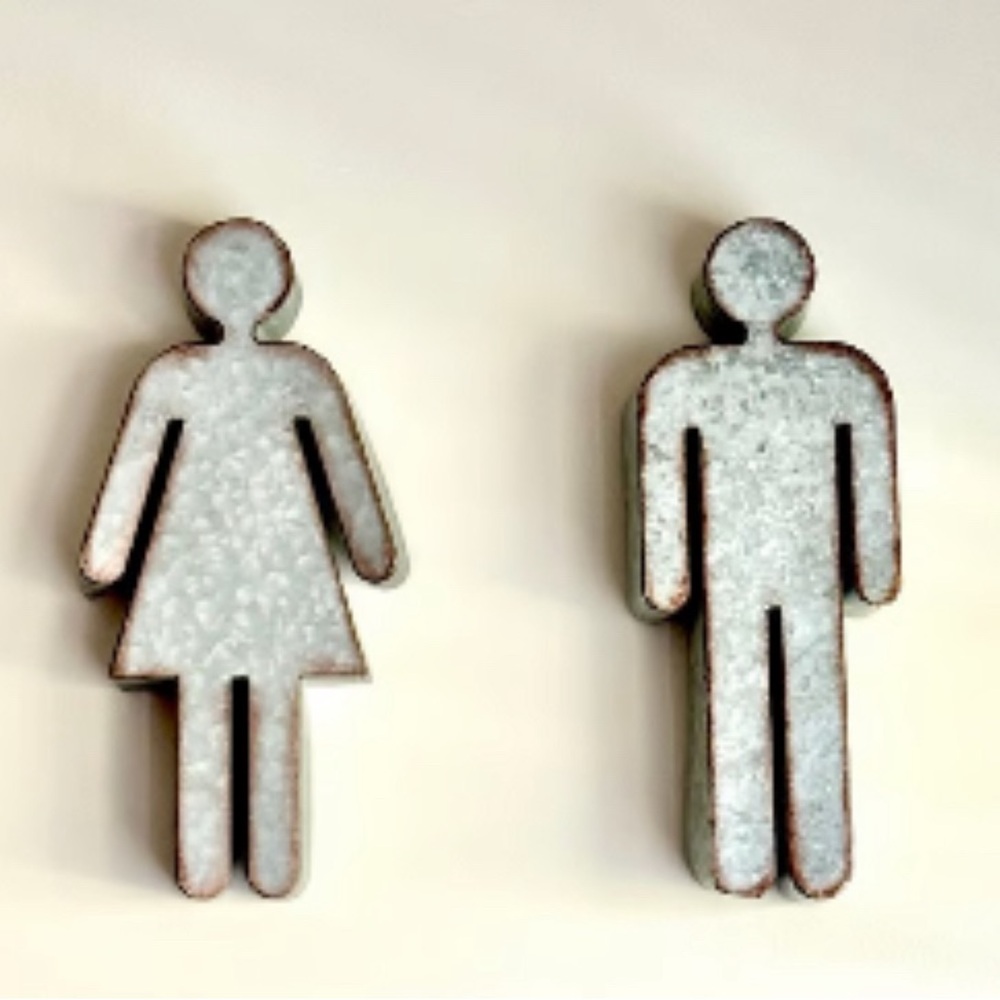 Galvanized metal his and hers symbols.